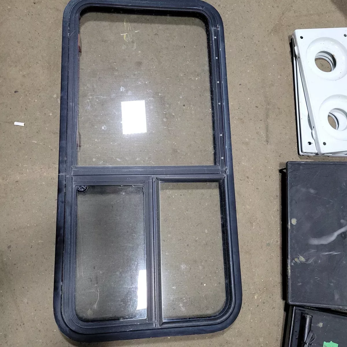 Used Black Radius Emergency Opening Window : 21 3/4" X 45 3/4" X 2" D