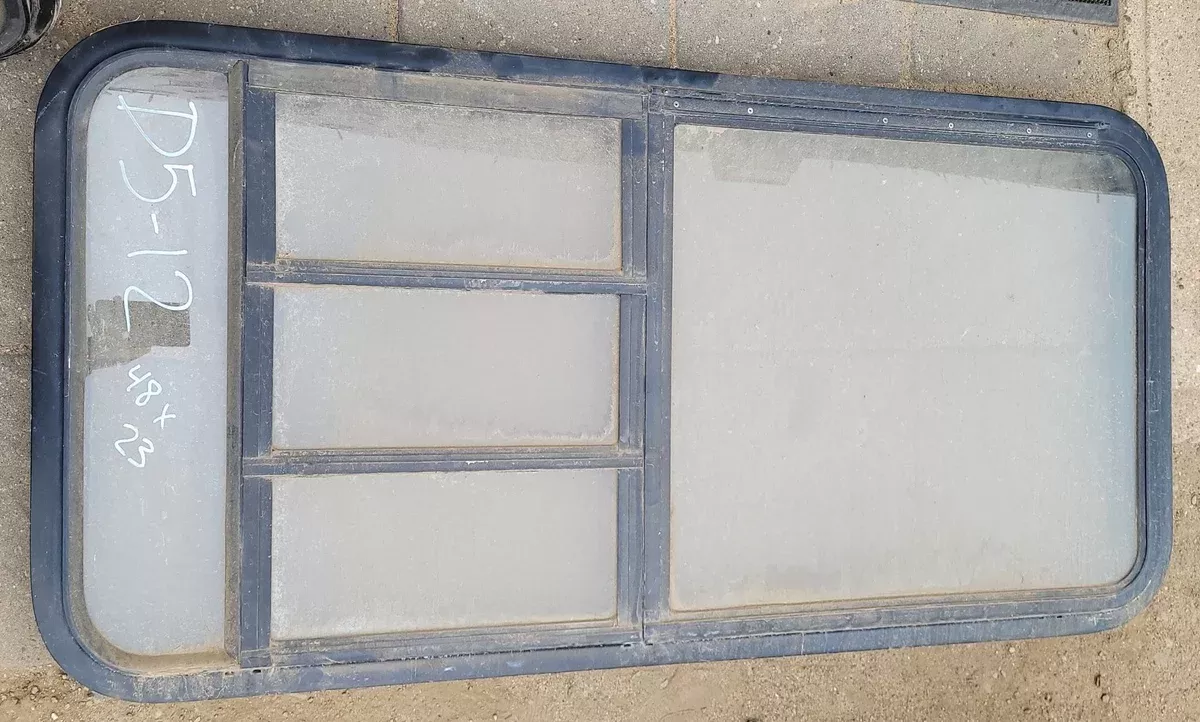 Used Black Radius Emergency Opening Window - 47.50 X 22.5 X 1.375